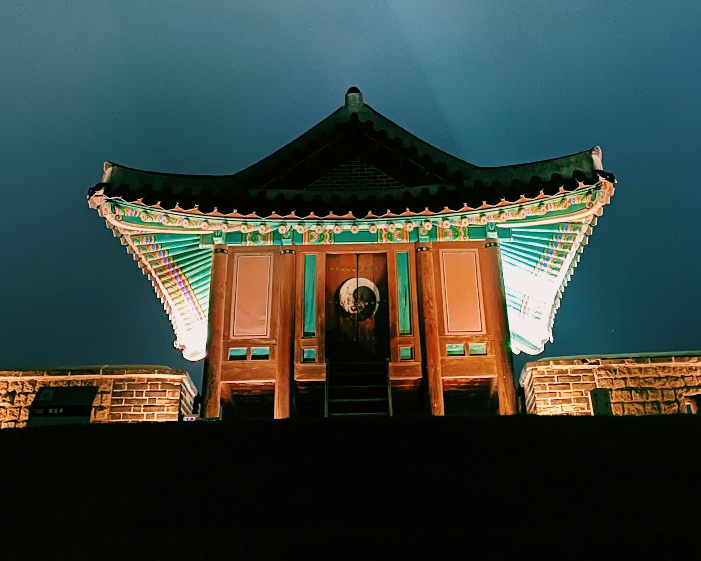 Suwon Hwaseong Fortress pavilion lit up at night