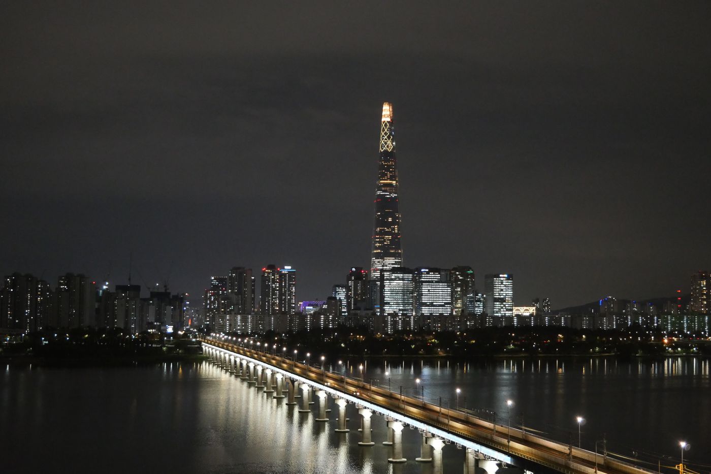 Seoul night skyline with Lotte World Tower and the Han River
